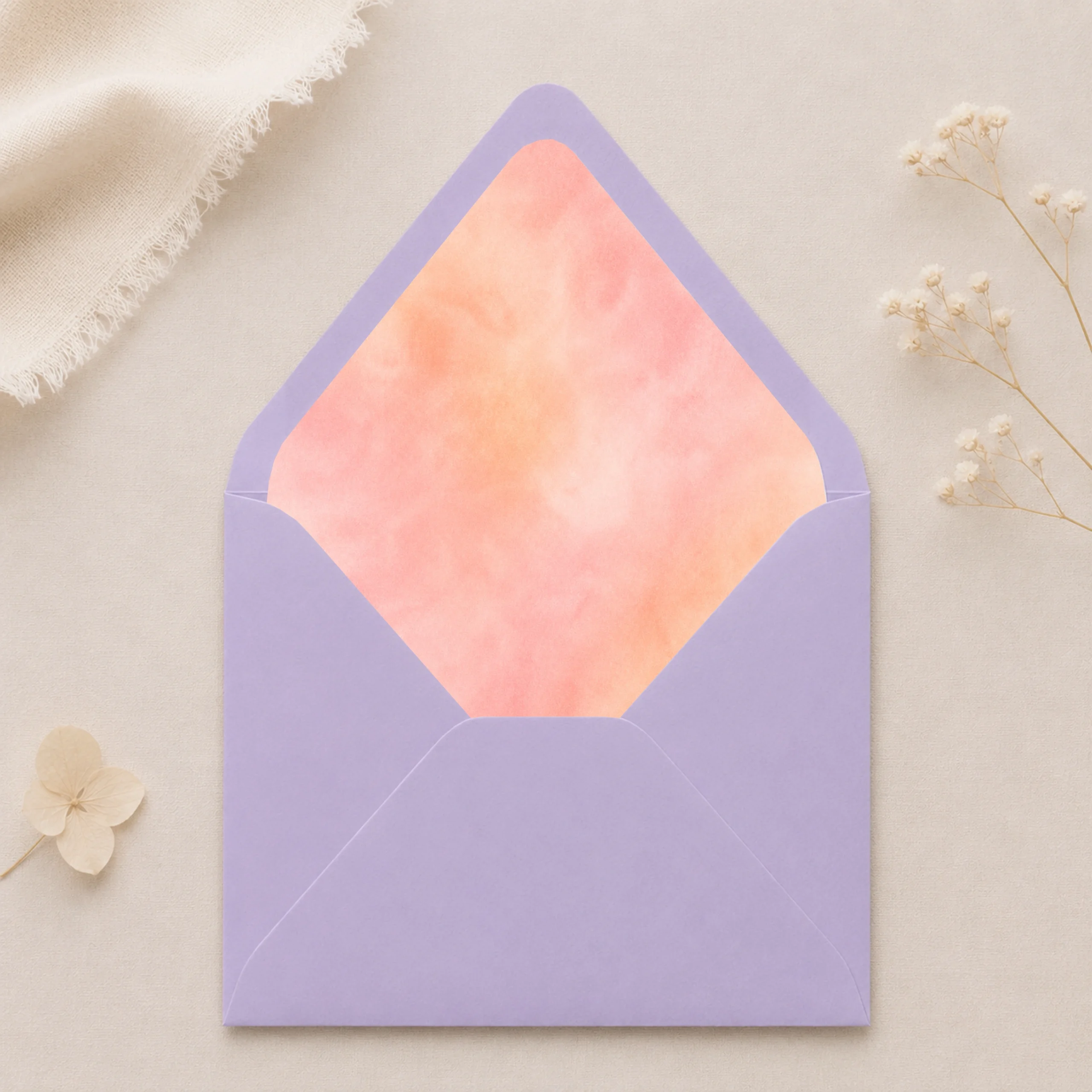 Lavender envelope with Apricot Blush watercolor envelope liner in soft apricot, peach, and blush tones, creating a romantic and elegant wedding invitation presentation.